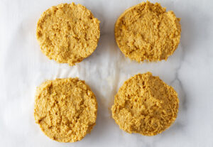 Shape your burgers into 4in patties