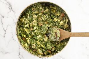 Ingredients 1 tbsp extra virgin olive oil 4 bell peppers, cut in halves lengthwise 3 garlic cloves, minced 400 ml (14 oz) canned artichokes, strained and chopped 300 ml (10 oz) frozen spinach, thawed and strained 2 springs fresh thyme 135g (5 oz) vegan cream cheese salt and black pepper, to taste Ãƒâ€šÃ‚Â½ cup of vegan mozzarella cheese, grated Instructions ÃƒÂ¢Ã¢â€šÂ¬Ã‚Â¢ Heat oven to 375F. Grease a 9x13-inch baking pan with olive oil. Set aside. ÃƒÂ¢Ã¢â€šÂ¬Ã‚Â¢ Arrange the bell peppers in the prepared baking pan. ÃƒÂ¢Ã¢â€šÂ¬Ã‚Â¢ Over medium heat in a large skillet, add in the garlic, onion, thyme, and fry until onions are translucent about 2 minutes. Then, add the mushrooms and fry for another 5 minutes until soft, and then the cashew cream cheese, spinach, and artichokes. Fry until the cashew cheese is fully melted and integrated into the mixture and most of the water has evaporated. Season with salt and black pepper to taste. ÃƒÂ¢Ã¢â€šÂ¬Ã‚Â¢ Spoon in the filling to peppers dividing it evenly among them. Sprinkle cheese over the top and bake for 30-40 minutes or until the peppers have blistered.