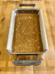 Pour batter into loaf pan