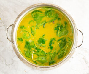 Adding the spinach